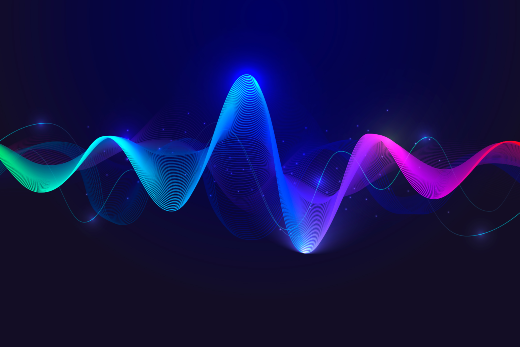 Imagem: fundo negro e, em primeiro plano, ondas sonoras nas cores verde, azul, anil e violeta