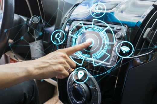 Imagem: uma mão clicando no painel de um carro e aparecendo diversas aplicações por realidade aumentada
